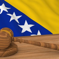 Judgment in favor of FLD beneficiary, a woman war survivor, for forced collection of awarded damages